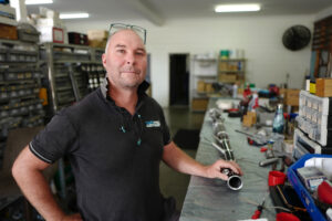 Tapepro employee in the workshop, working on a taper tube.